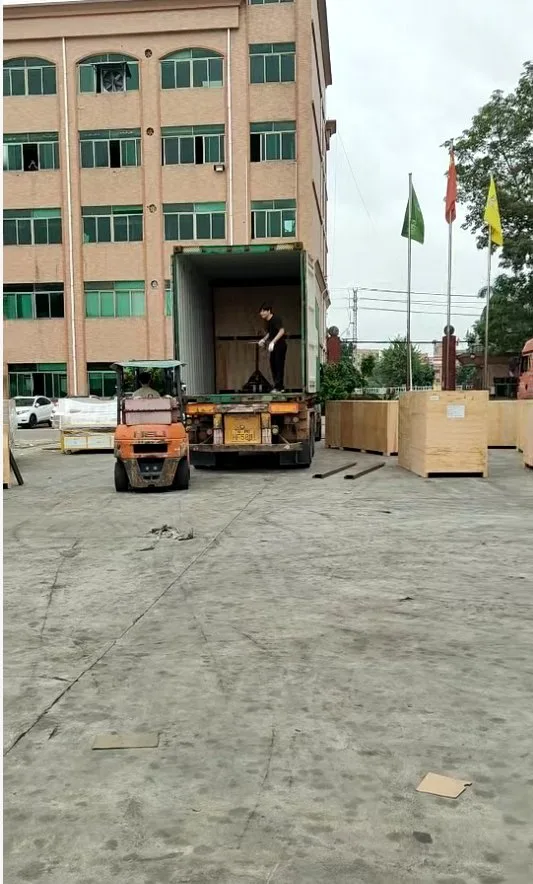 Actual footage of forklifts loading equipment for export orders; after the units are secured, they are loaded into shipping containers one by one using forklifts.