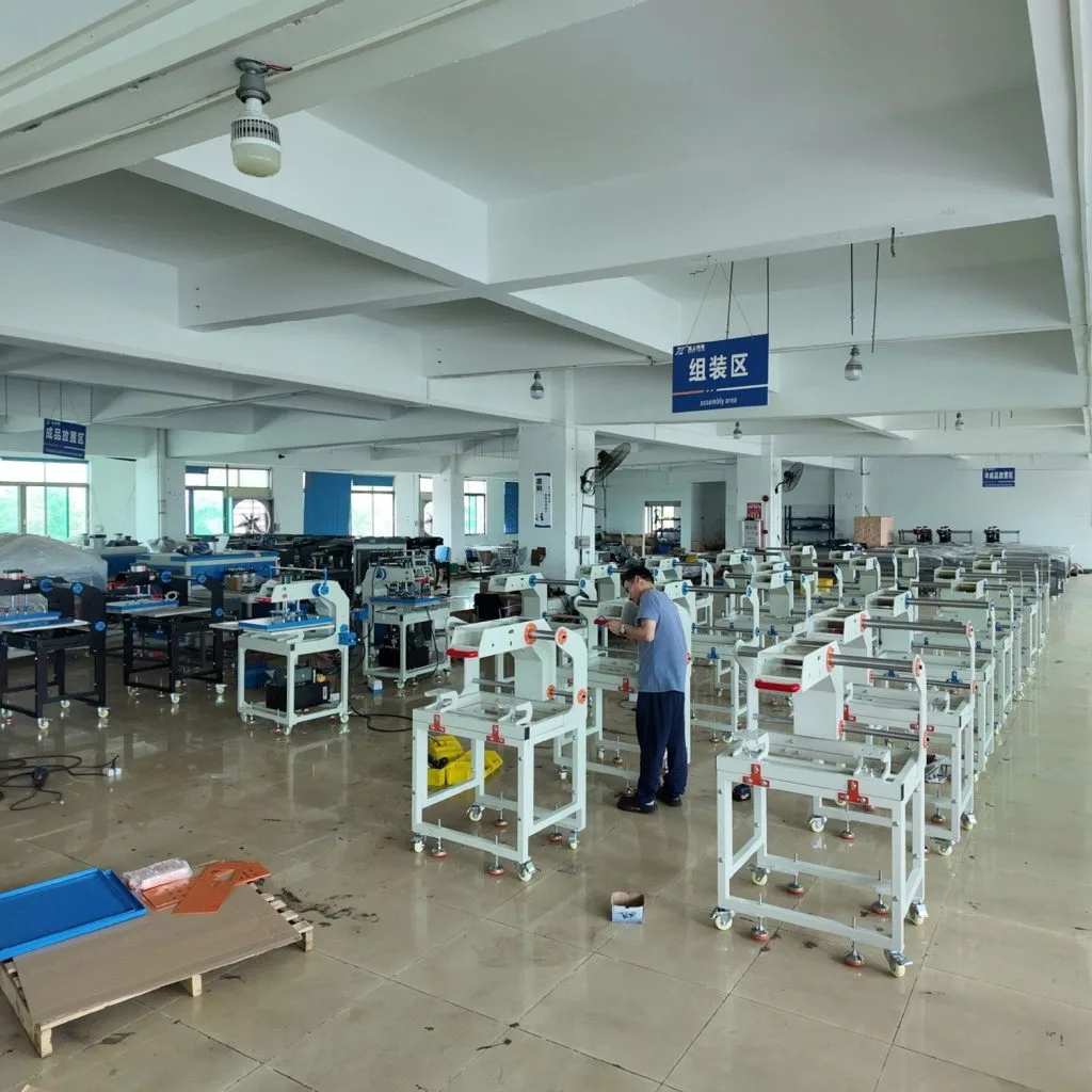 Actual footage from the Heat Press Machine assembly workshop, showing an engineer assembling a complete Heat Press Machine