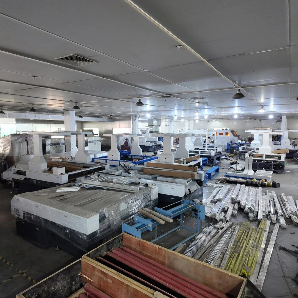Actual photos from a Fabric Laser Cutting Machine production workshop; the laser cutting equipment assembly site