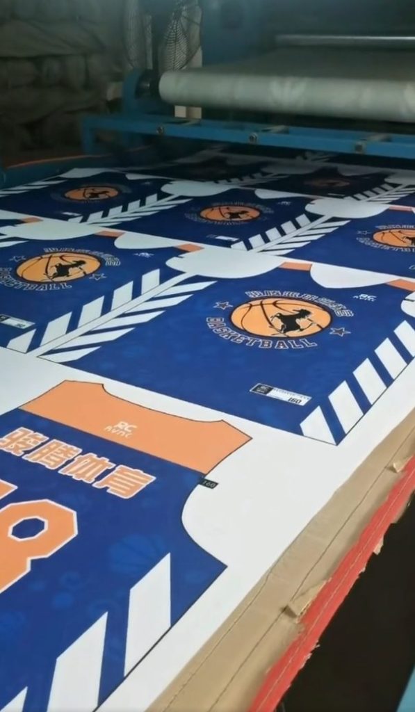 Actual photos of basketball-patterned printed fabric for apparel following consecutive production runs