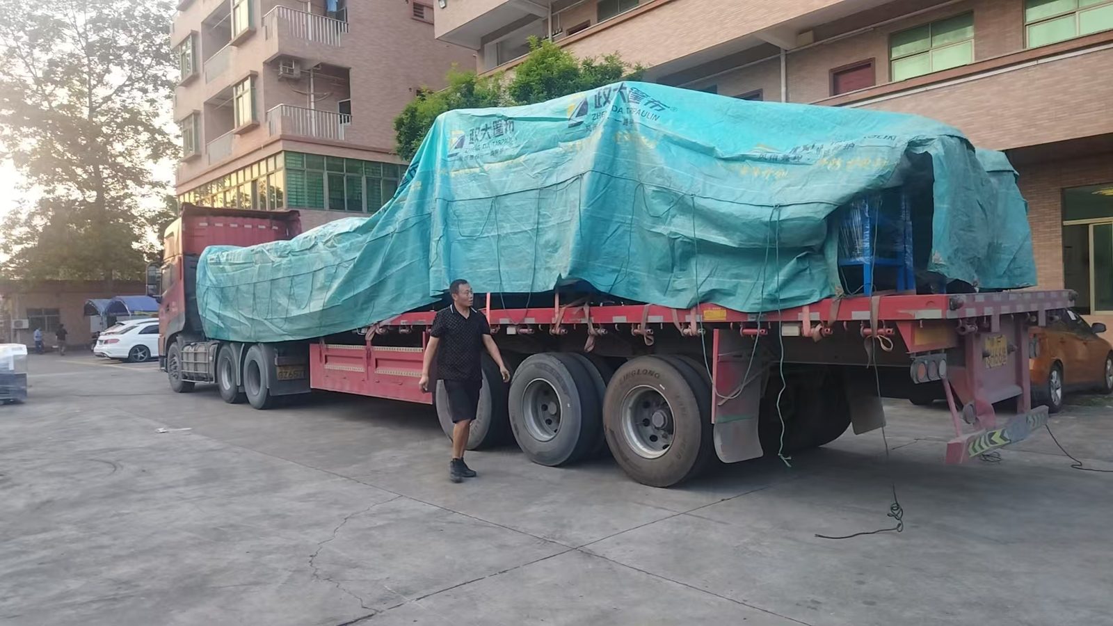 Shipping of Sublimation Roller Printers and Fabric Feeders to Hubei via Tarpaulin-Covered Trucks